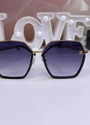 Модні жіночі брендові сонцезахисні окуляри в металевій оправі ...4 фото