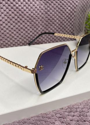 Модні жіночі брендові сонцезахисні окуляри в металевій оправі ...6 фото
