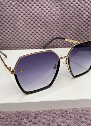 Модні жіночі брендові сонцезахисні окуляри в металевій оправі ...8 фото