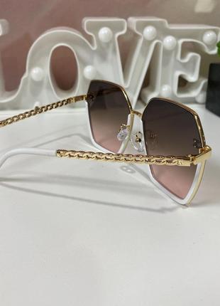 Модні жіночі брендові сонцезахисні окуляри в металевій оправі ...7 фото