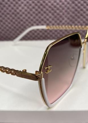 Модні жіночі брендові сонцезахисні окуляри в металевій оправі ...9 фото
