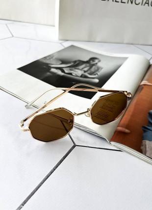 Модні жіночі сонцезахисні окуляри в металевій оправі поляризац...6 фото