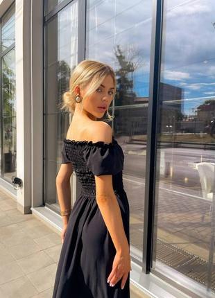 Довга чорна жіноча сукня на резинці3 фото