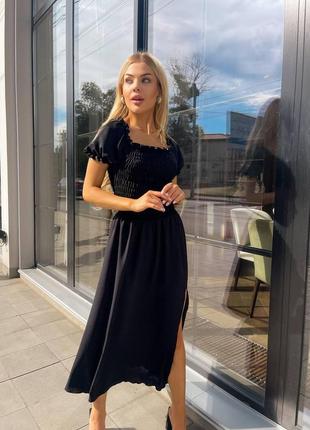 Довга чорна жіноча сукня на резинці6 фото