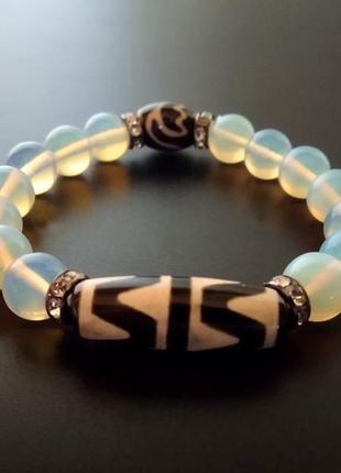 Браслет с тибетскими бусинами дзи " волна" и "лотос"