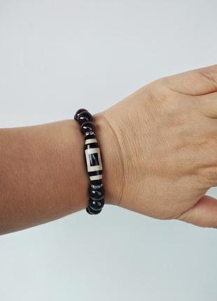 Браслет-талисман с бусиной дзи "небо и земля" из граната