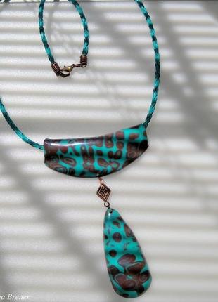 Кулон у плямах 5