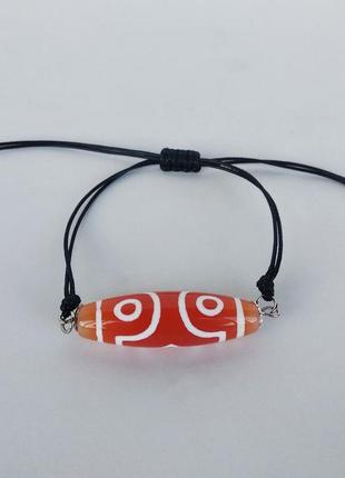 Браслет шамбала - талисман с тибетской бусиной дзи " 3 глаза " из сердолика