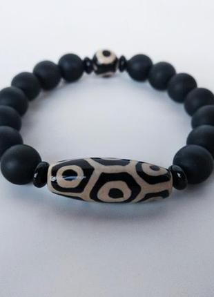 Браслет с тибетской бусиной дзи " 9 глаз " из оникса