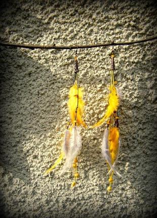 Длинны серьги с перьями солнце и тучи5 фото