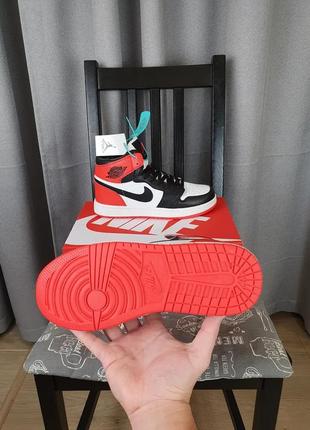 Кроссовки унисекс черные с красным nike air jordan 1 retro. найк аир джордан 1 ретро обувь мужская и женская9 фото