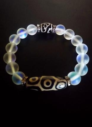 Браслет - талисман с тибетскими бусинами дзи " 9 глаз" и "лотос"