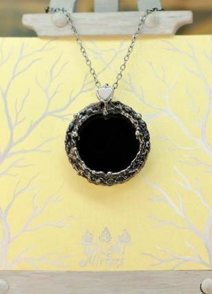 The twilight mirror pendant the heart of twilight forest