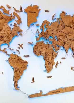 Дерев'яна карта світу на стіні з підсвічуванням3 фото