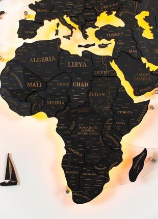 Деревянная карта мира на стену 100х60 см черная с подсветкой3 фото
