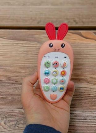 Розвиваюча іграшка "морковка-телефон" (блакитний)2 фото