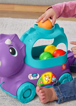 Игрушка-каталка fisher-price веселый трицератопс hnr535 фото