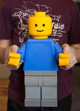 Лего-человечек держатель туалетной бумаги1 фото