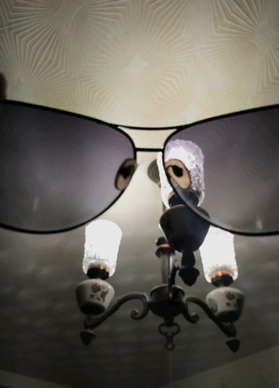 Сонцезахисні окуляри жіночі та дитячі8 фото