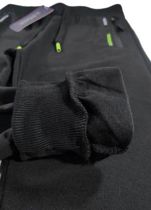 Спортивные штаны черные с манжетом для мужчин l(48)5 фото