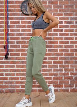 Спорт штани жіночі на флісі колір оливковий3 фото