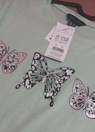 Жіноча трикотажна футболка м'ятного кольору з метеликами new look розмір 12 (євр.40)3 фото