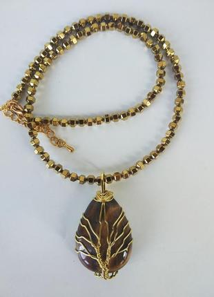 Ожерелье из золотого гематита с кулоном