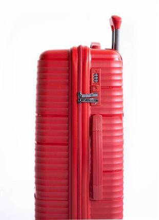 Пластикова маленька валіза з полікарбонату 36l horoso червона3 фото