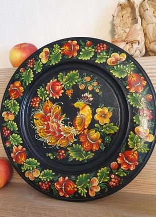 Декоративная деревянная тарелка, петриковская роспись1 фото