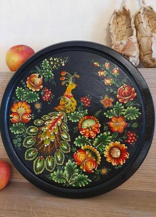 Декоративная деревянная тарелка, петриковская роспись1 фото