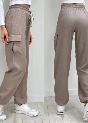 Льняные брюки карго на резинке с карманами свободного кроя3 фото