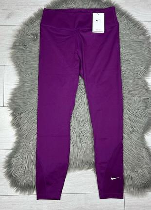 Яскраво фіолетові спортивні лосини