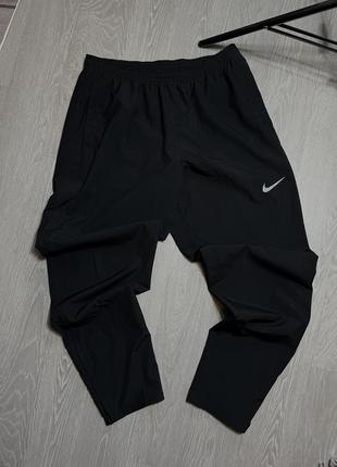 Нейлоновые брюки nike2 фото