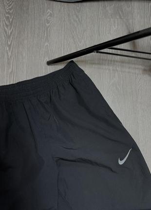 Нейлоновые брюки nike7 фото