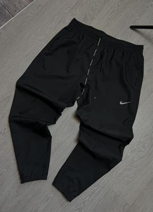 Нейлоновые брюки nike1 фото