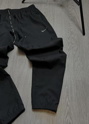 Нейлоновые брюки nike4 фото