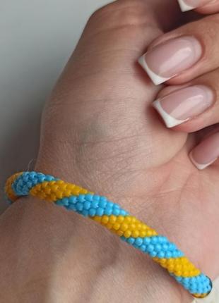 Жовто-блакитний браслет із бісеру ручної роботи "слава україні"1 фото