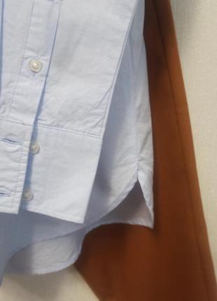 Рубашка нежно голубая,прямая, с закругленными розрезами по бокам качество классное..5 фото