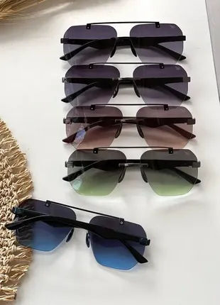 Жіночі фігурні сонцезахисні окуляри без обідка у кольорах із захистом uv400