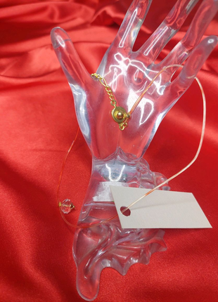 Подвес-бусиина на шнуре.