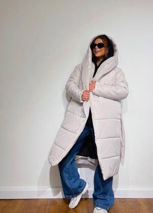 Жіноча зимова тепла довга куртка з капюшоном2 фото