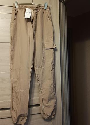 Штани плащівка