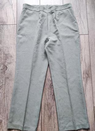 Женские легкие брюки оливковый цвет1 фото