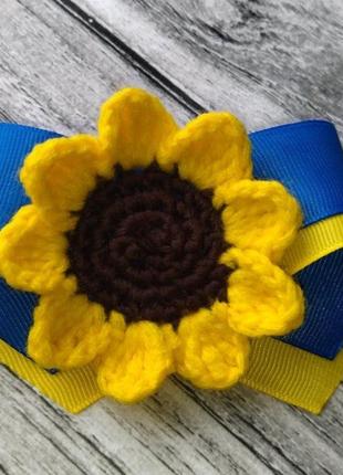 Значок соняшник з синьо-жовтими стрічками - слава украйні - патріотична символіка1 фото