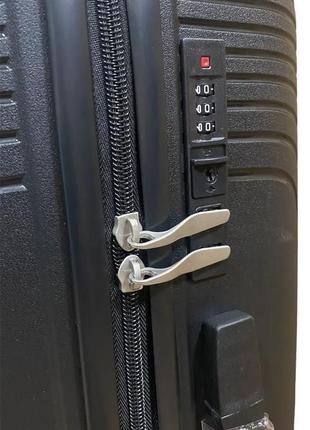 Середній полипропиленовый дорожній валізу на 4-х колесах"fly" м2 фото