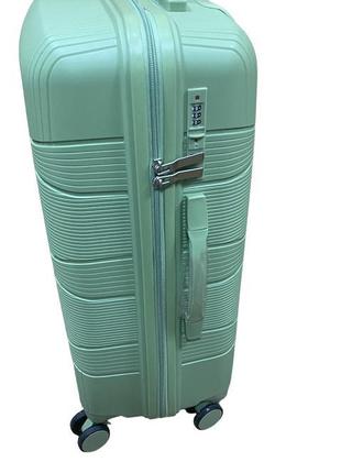 Середній полипропиленовый дорожній валізу на 4-х колесах"fly" м3 фото