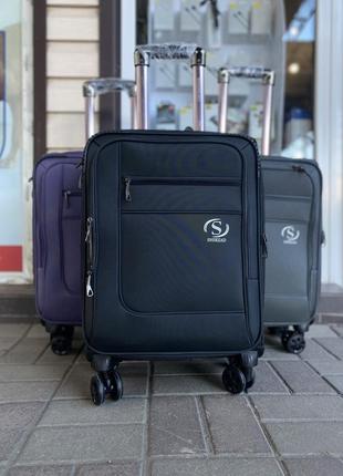 Дорожня валіза ручна поклажа на 4 колесах фіолетова3 фото