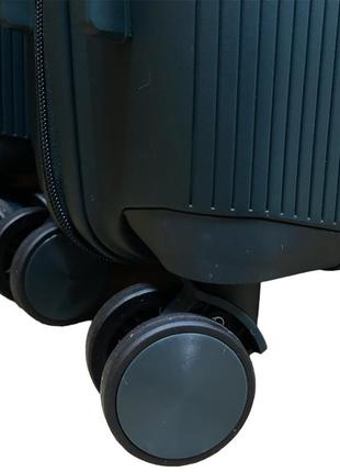 Середній полипропиленовый дорожній валізу на 4-х колесах"fly" м5 фото