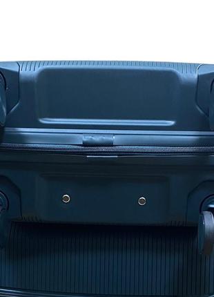 Середній полипропиленовый дорожній валізу на 4-х колесах"fly" м6 фото