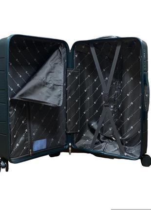 Середній полипропиленовый дорожній валізу на 4-х колесах"fly" м7 фото
